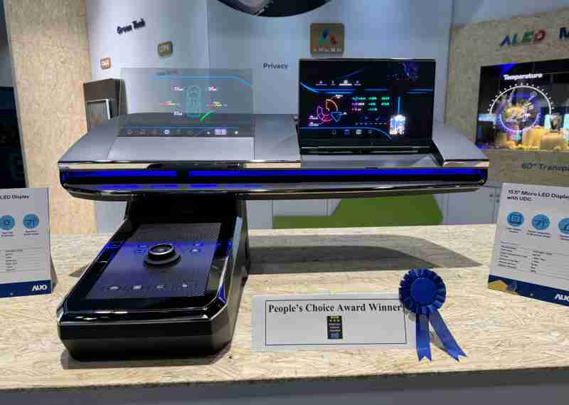 MG电玩车用Micro LED Display HMI解决方案获”最佳车用显示奖”，，以用户为中心开发，，，针对前座驾驶与乘客设计兼具娱乐与安全的高画质屏幕，，，包含车舱前座的Micro LED透明屏幕及全球首款内建镜头的智慧Micro LED显示器